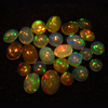 Ethiopian Opal - really - tope grade high quality CABOCHON - mix lot - each pcs - have amazing - beautifull - flashy fire all around in the stone - size - 4 - 6 mm approx 25 pcs STUNNING QUALITY - VERY VERY RARE